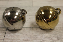 Load image into Gallery viewer, Set of Jungle Bells Salt and Pepper Shakers - Gold and Silver - Used