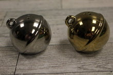 Load image into Gallery viewer, Set of Jungle Bells Salt and Pepper Shakers - Gold and Silver - Used