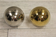 Load image into Gallery viewer, Set of Jungle Bells Salt and Pepper Shakers - Gold and Silver - Used