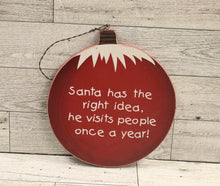 Load image into Gallery viewer, Christmas Sign &quot;Santa Has The Right Idea,- He Visits People Once A Year - Used.